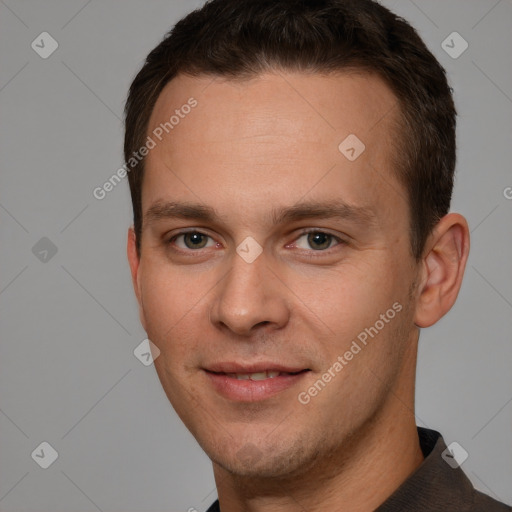 Joyful white young-adult male with short  brown hair and brown eyes