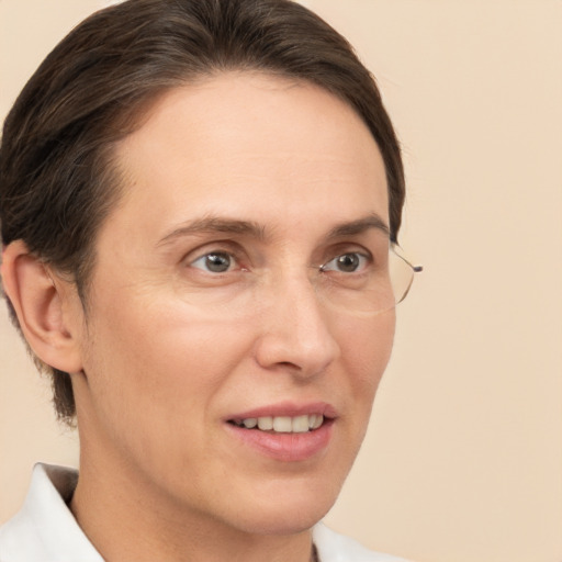 Joyful white adult female with short  brown hair and brown eyes