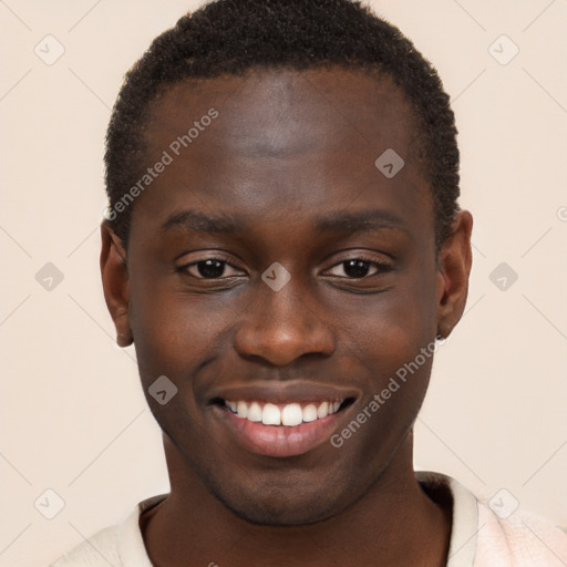 Joyful black young-adult male with short  brown hair and brown eyes