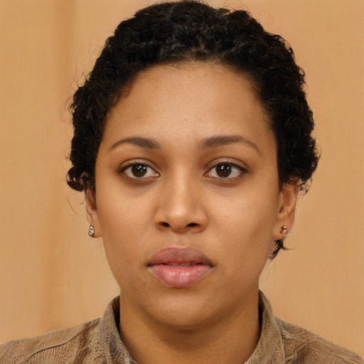 Neutral latino young-adult female with short  black hair and brown eyes