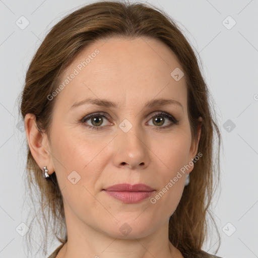 Joyful white adult female with medium  brown hair and grey eyes