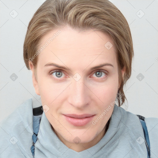 Joyful white young-adult female with medium  brown hair and blue eyes