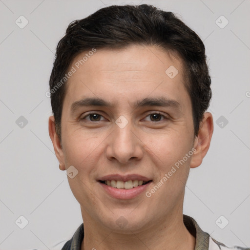 Joyful white adult male with short  brown hair and grey eyes