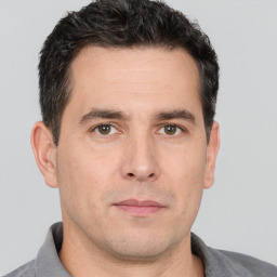 Neutral white adult male with short  brown hair and brown eyes