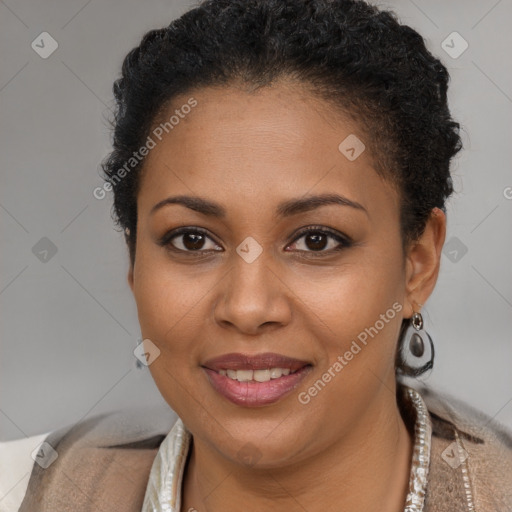 Joyful black young-adult female with short  brown hair and brown eyes