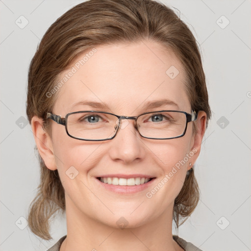 Joyful white young-adult female with medium  brown hair and blue eyes