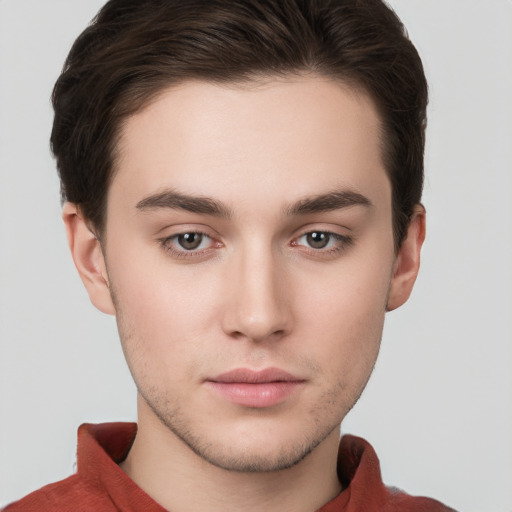 Neutral white young-adult male with short  brown hair and brown eyes