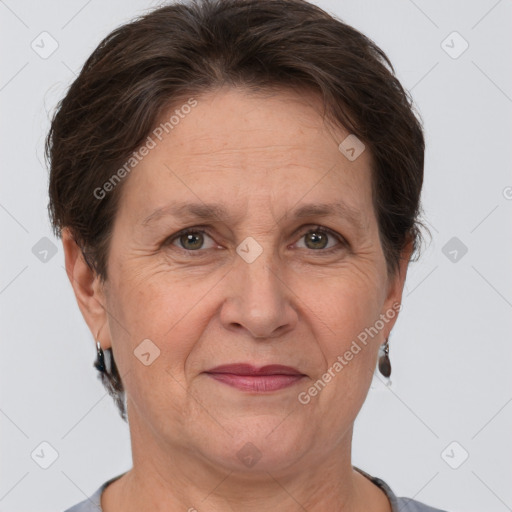 Joyful white adult female with short  brown hair and brown eyes