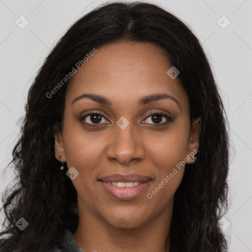 Joyful black young-adult female with long  brown hair and brown eyes