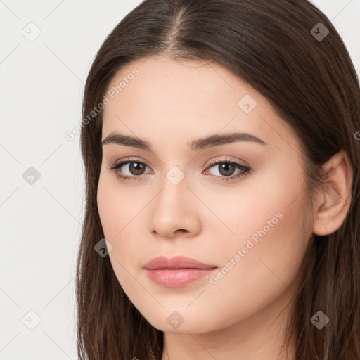 Neutral white young-adult female with long  brown hair and brown eyes