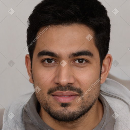 Joyful white young-adult male with short  black hair and brown eyes