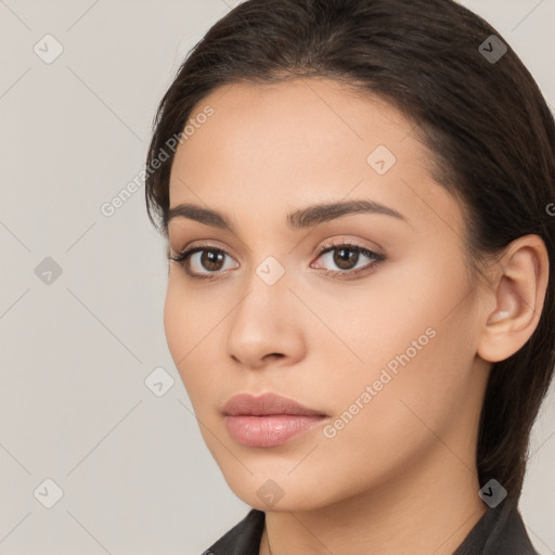 Neutral white young-adult female with long  brown hair and brown eyes