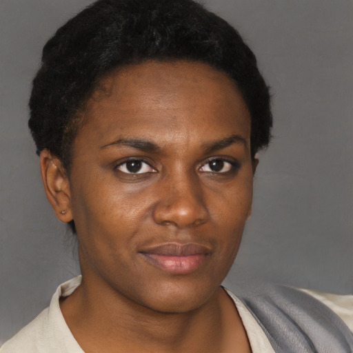Neutral black young-adult female with short  black hair and brown eyes