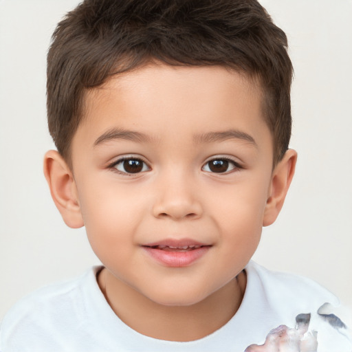 Joyful white child male with short  brown hair and brown eyes