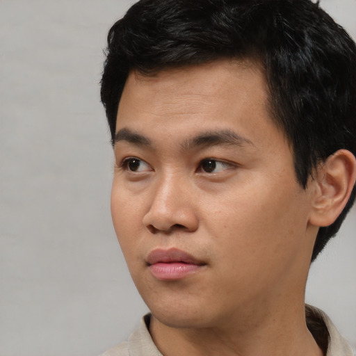 Neutral asian young-adult male with short  black hair and brown eyes