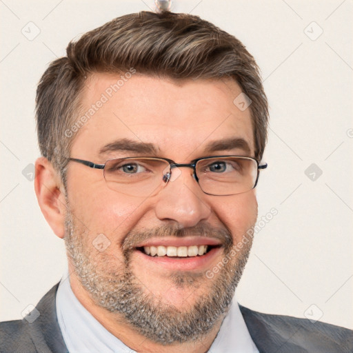 Joyful white adult male with short  brown hair and brown eyes