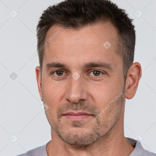 Neutral white adult male with short  brown hair and brown eyes