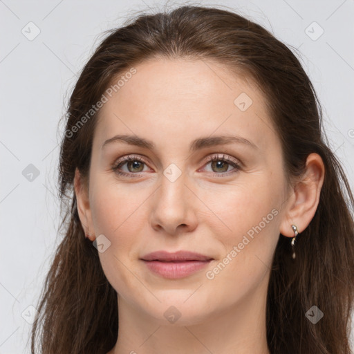 Joyful white young-adult female with long  brown hair and grey eyes