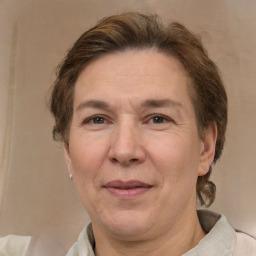 Joyful white adult female with short  brown hair and brown eyes