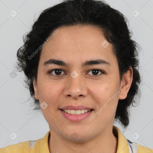 Joyful latino young-adult female with short  brown hair and brown eyes