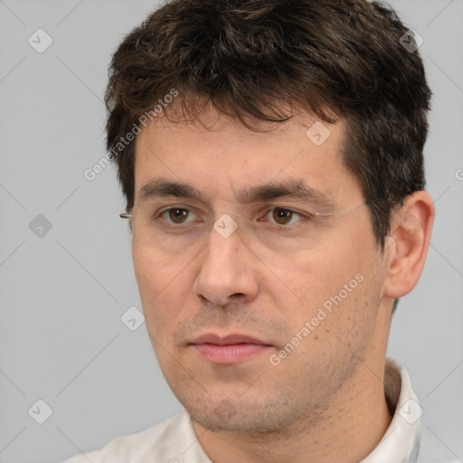 Neutral white adult male with short  brown hair and brown eyes