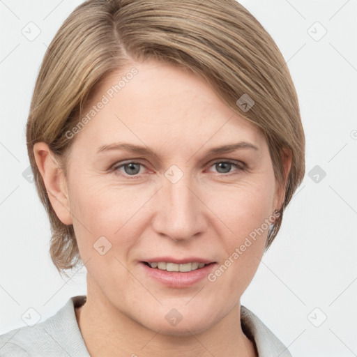 Joyful white adult female with short  brown hair and grey eyes