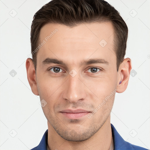 Neutral white young-adult male with short  brown hair and grey eyes