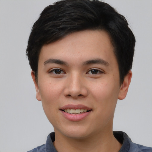 Joyful asian young-adult female with short  black hair and brown eyes