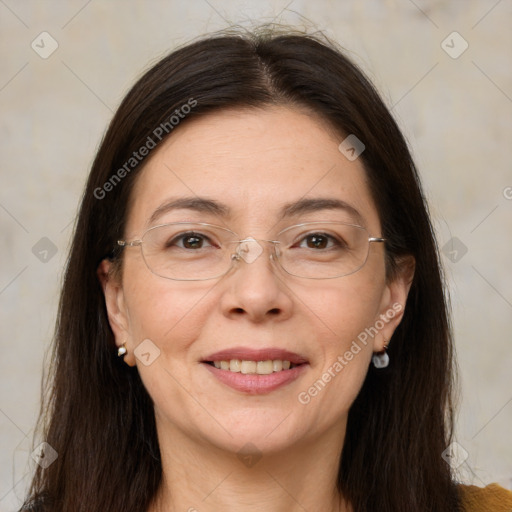 Joyful white adult female with long  brown hair and brown eyes