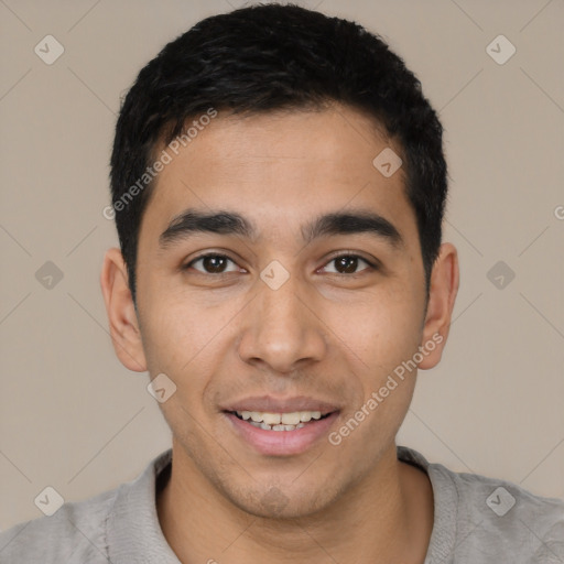 Joyful latino young-adult male with short  black hair and brown eyes