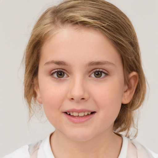 Joyful white child female with medium  brown hair and brown eyes