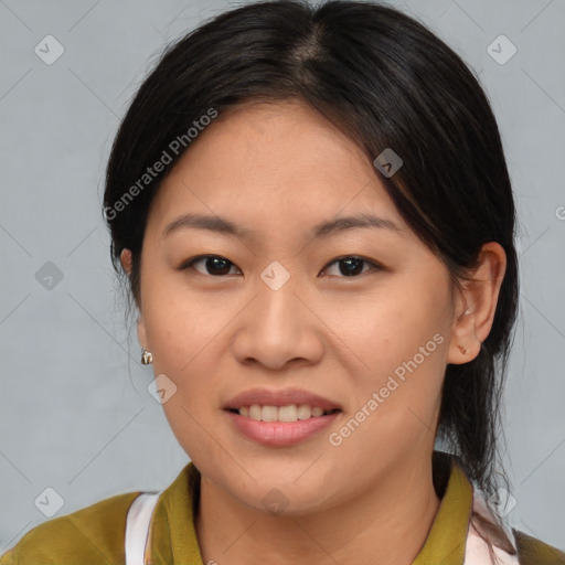 Joyful asian young-adult female with medium  brown hair and brown eyes