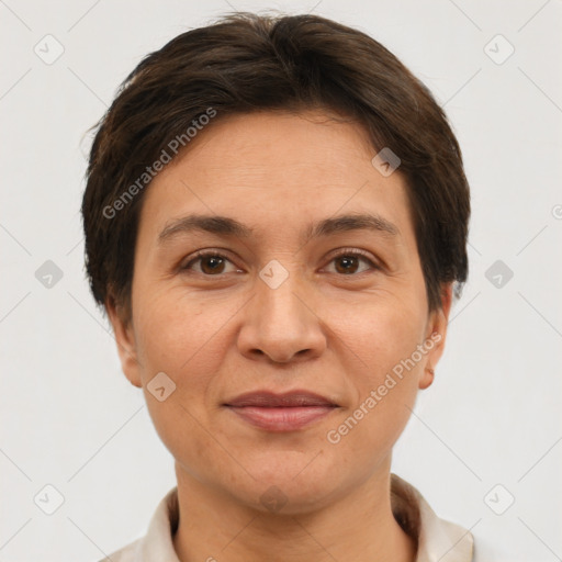 Joyful white adult female with short  brown hair and brown eyes