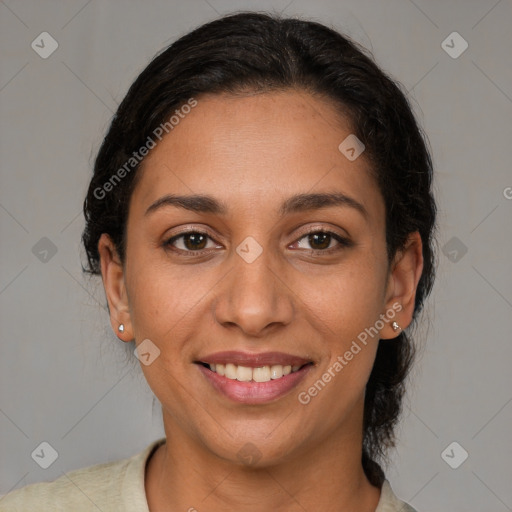 Joyful latino young-adult female with medium  brown hair and brown eyes