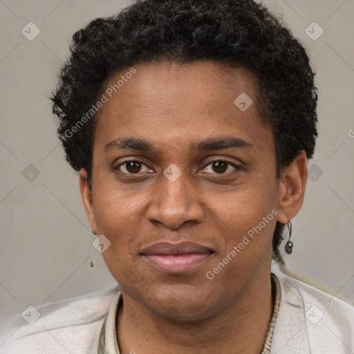 Joyful black young-adult male with short  brown hair and brown eyes