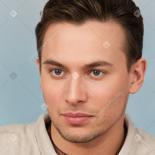 Neutral white young-adult male with short  brown hair and brown eyes