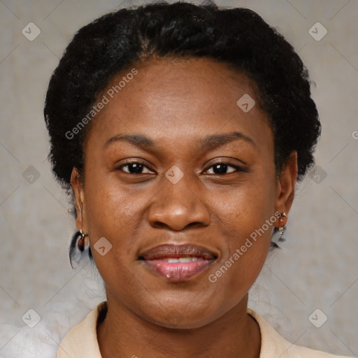 Joyful black adult female with short  brown hair and brown eyes