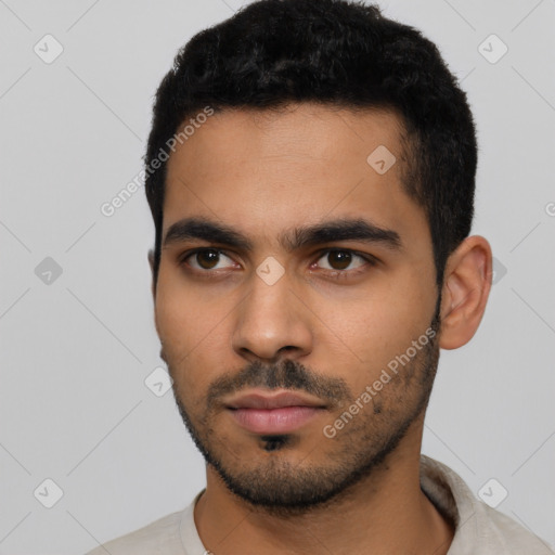 Neutral latino young-adult male with short  black hair and brown eyes