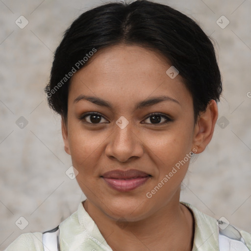 Joyful latino young-adult female with short  brown hair and brown eyes