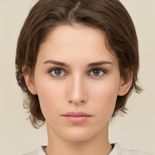 Neutral white young-adult female with medium  brown hair and brown eyes