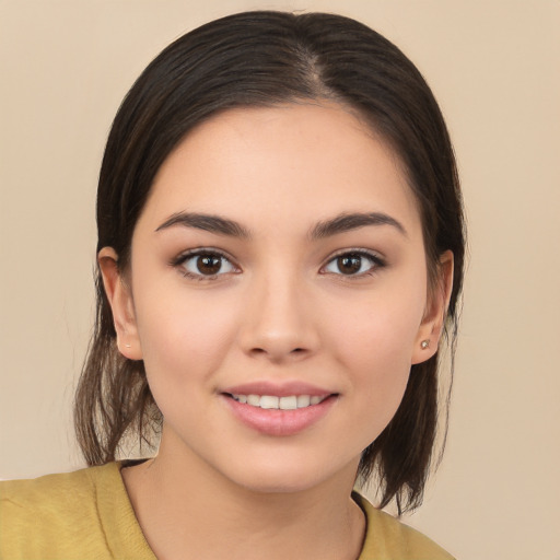 Joyful white young-adult female with medium  brown hair and brown eyes