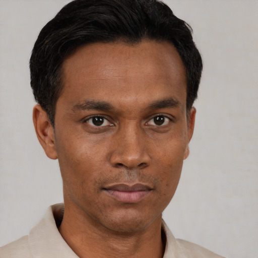 Neutral asian young-adult male with short  brown hair and brown eyes
