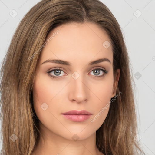 Neutral white young-adult female with long  brown hair and brown eyes