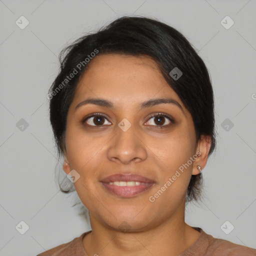 Joyful latino young-adult female with medium  black hair and brown eyes