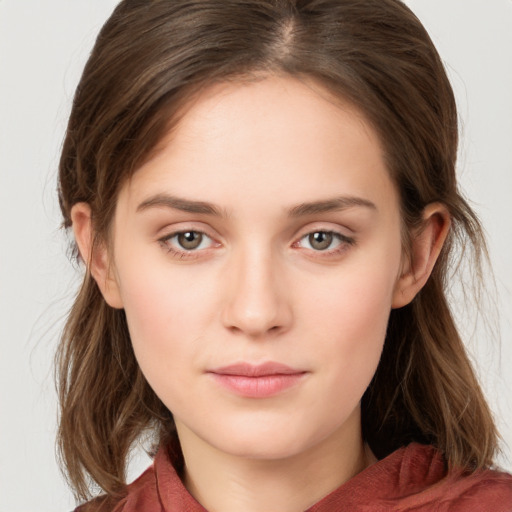 Neutral white young-adult female with medium  brown hair and brown eyes