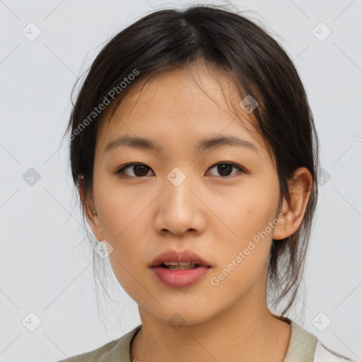 Neutral asian young-adult female with medium  brown hair and brown eyes