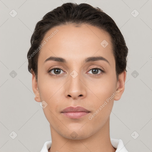 Neutral white young-adult female with short  brown hair and brown eyes