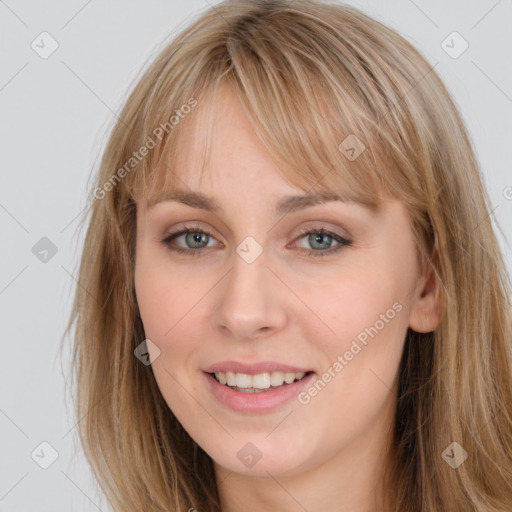 Joyful white young-adult female with long  brown hair and grey eyes