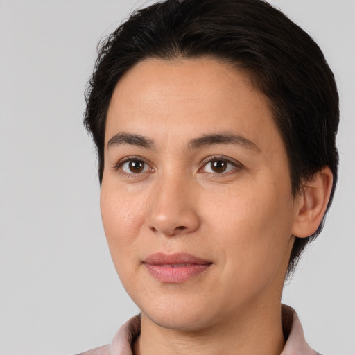 Joyful white young-adult female with short  brown hair and brown eyes
