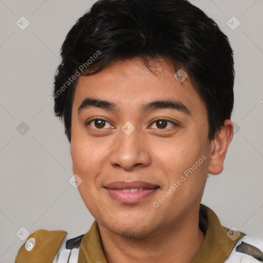 Joyful asian young-adult male with short  brown hair and brown eyes